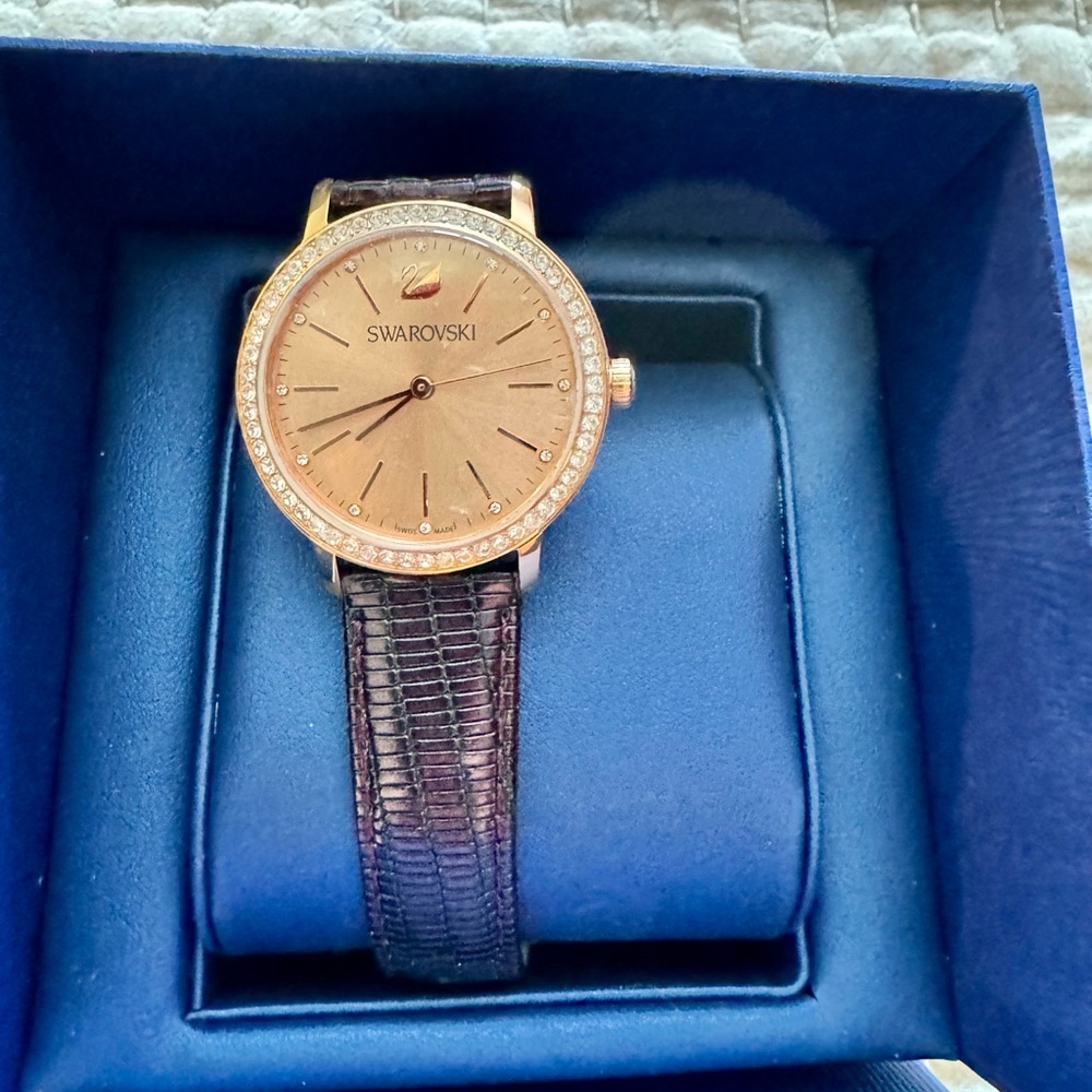 Swarovski Graceful Lady Rose Gold Purple leather watch.  New. Worn one time.
